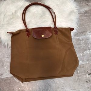 Super cute tan canvas bag with leather straps no holes good used condition